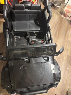Boys 4 x 4 comes with charger music grandson is too big for