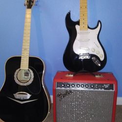 Acoustic Guitar And Electric Guitar An Amplifier