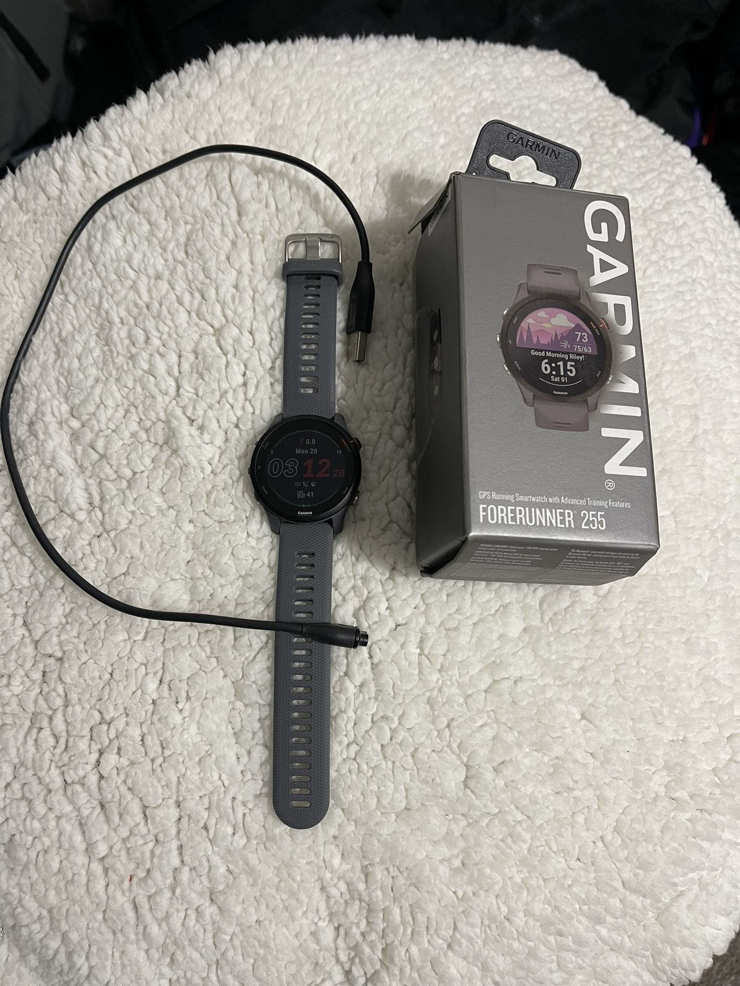 Garmin four Runner 255 watch… comes With Charging Cable And Box