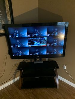 55 inch Sanyo and tv stand