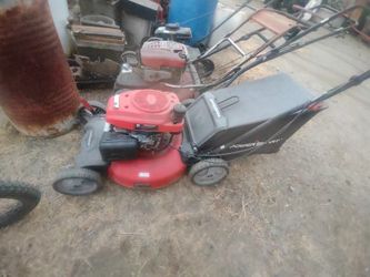 2 Lawnmowers Run Great 