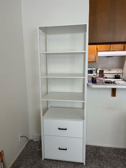 White bookshelf with 2 drawers