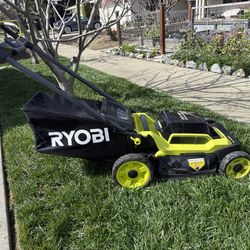 Ryobi 40 V push lawnmower + matching 40 V trimmer – up for grabs.