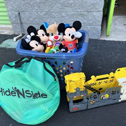 Box full of toys mickey mouse stuffed animals jurassic park disney