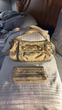 Coach gold canvas purse and matching wallet