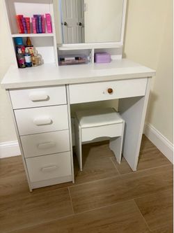 Vanity with mirror and chair