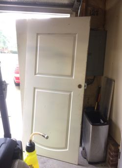 Two solid heavy wood doors