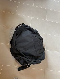 Black duffle bag.