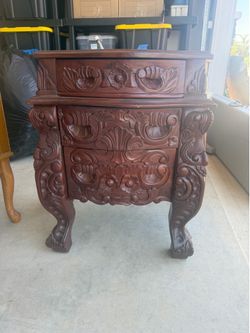 Ornate wood end table