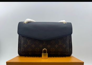 Brown and black chain bag