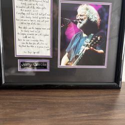 framed collectible featuring a photograph of Jerry Garcia and a facsimile (copy) of handwritten lyrics