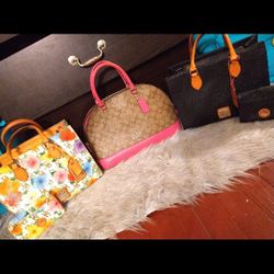 2 Dooney & Bourke Bags & Wristlets 1 Coach bag W/ Wristlet 