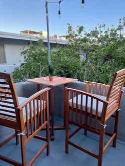 Safavieh Pate Bar-Height Patio Set: Pub Table + 2 Tall Armchairs, Solid Wood, Cushions + Covers