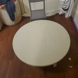 Round Table With One Small Chair 