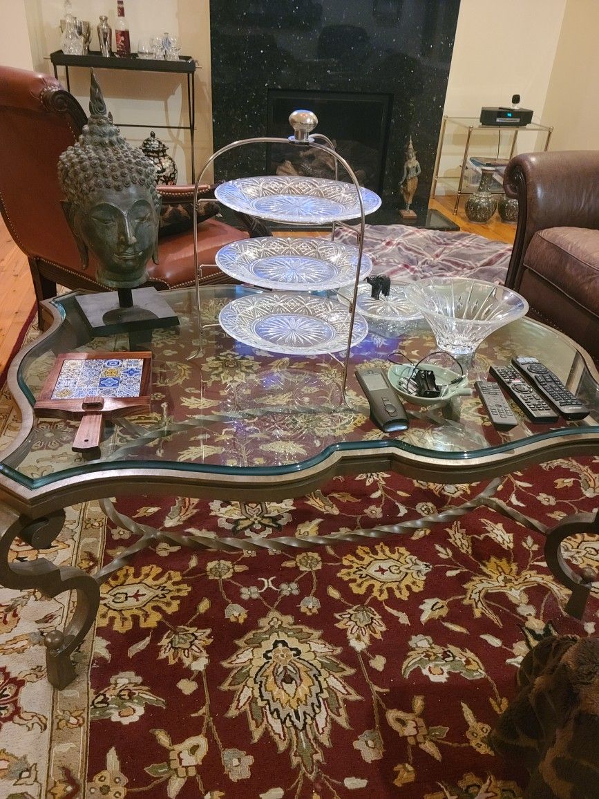glass iron table. 5 yes old