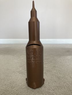 Vintage 1960’s Apollo Savings Rocket Still Bank, Chicago, Illinois.  Plastic, Height 9”, Copper Color 