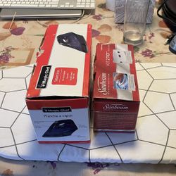 2 Steam Irons + Iron Board