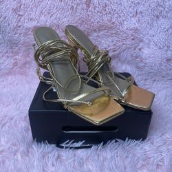 Gold strappy heels