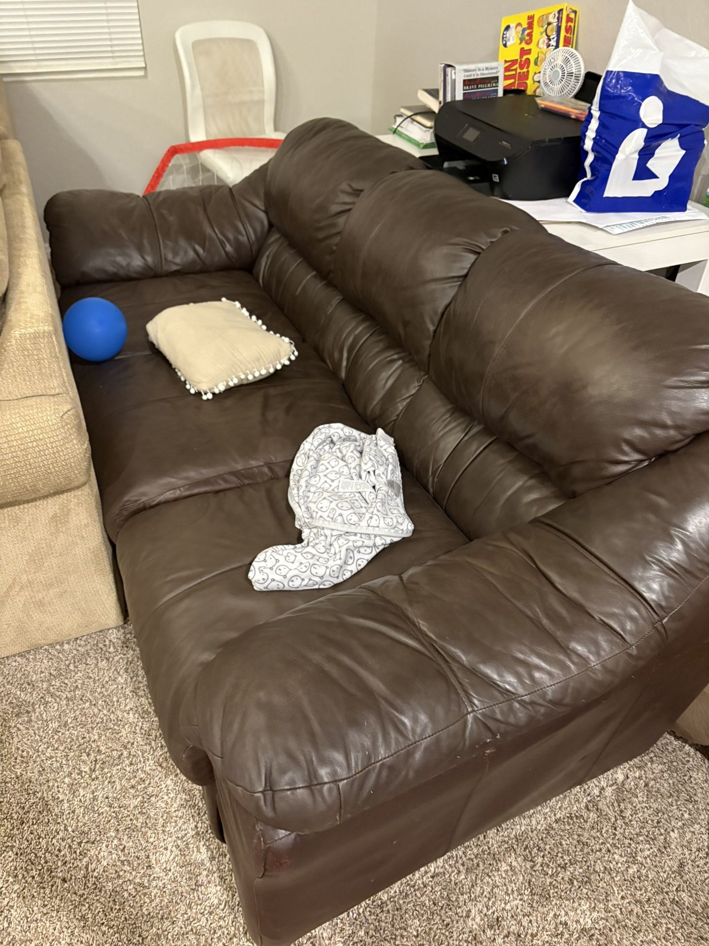 Used Brown Leather Couch.