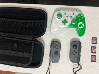 Nintendo Switch + Games + Controller Grip