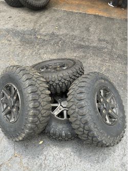 RZR factory wheels and tires