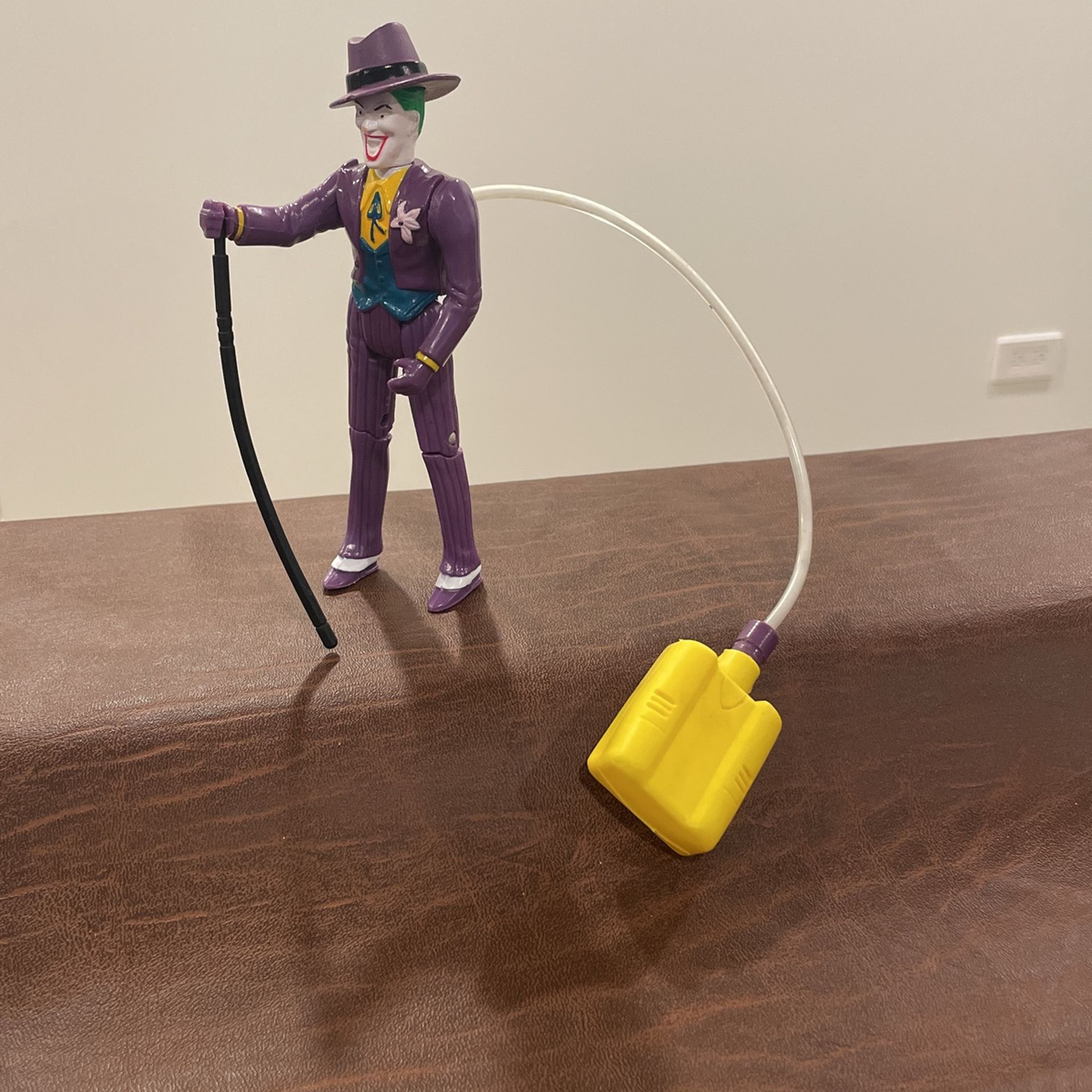 1989 Toy Biz Joker Batman Movie action figure squirting orchid