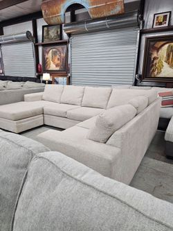 Beautiful Beige U-Shaped Sectional by Living Spaces – Delivery Available