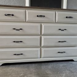 Solid Wood White Long Dresser With Nine Drawers In Very Good Condition All Drawers Open Just Fine  Dimensions high 36 inches wide 61 inches deep 18 in