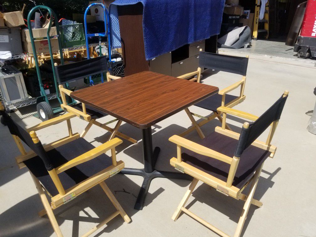Table with 4 directors chairs