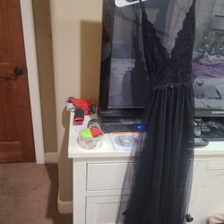 Black, Long Tulle Dress With Spaghetti Straps That Criss-cross In Back