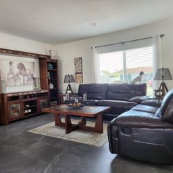 Couches And Media Center With Extra Tables