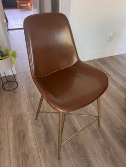 Set of three (3) Carmel colored bar stools