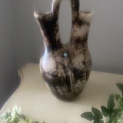 Vintage signed T. Vail Navajo pottery vase,  Hand Carved...