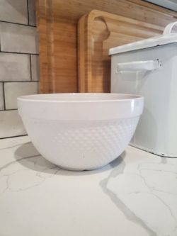 White stoneware mixing bowl with a hobnail design