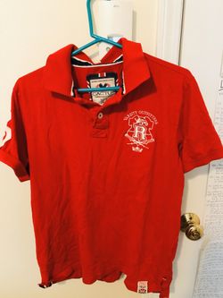 Médium polo , none smoking home. Tag says large but it’s more of a medium. “Authentic handcrafted goods “ Cactus polo” wore maybe twice.