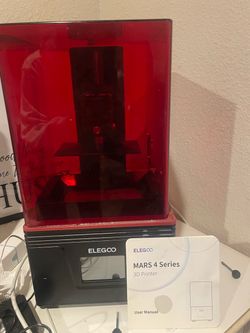 MARS 4 series 3D printer with 3/4 bottle of photopolymer resin