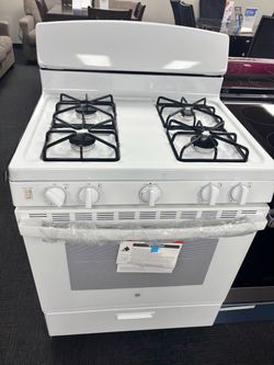White 4 burner Ge gas stove