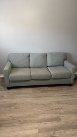 Rooms to go Light blue couch