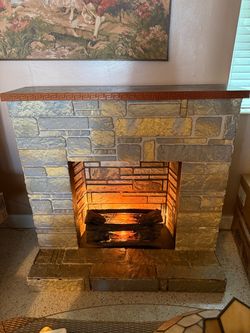 Vintage Freestanding Faux Stone Electric Fireplace & Mantel