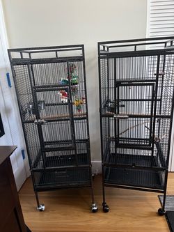 2 Bird Cages on Wheels.