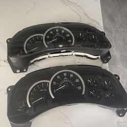 Two Escalade 2004 Speedometer Cluster