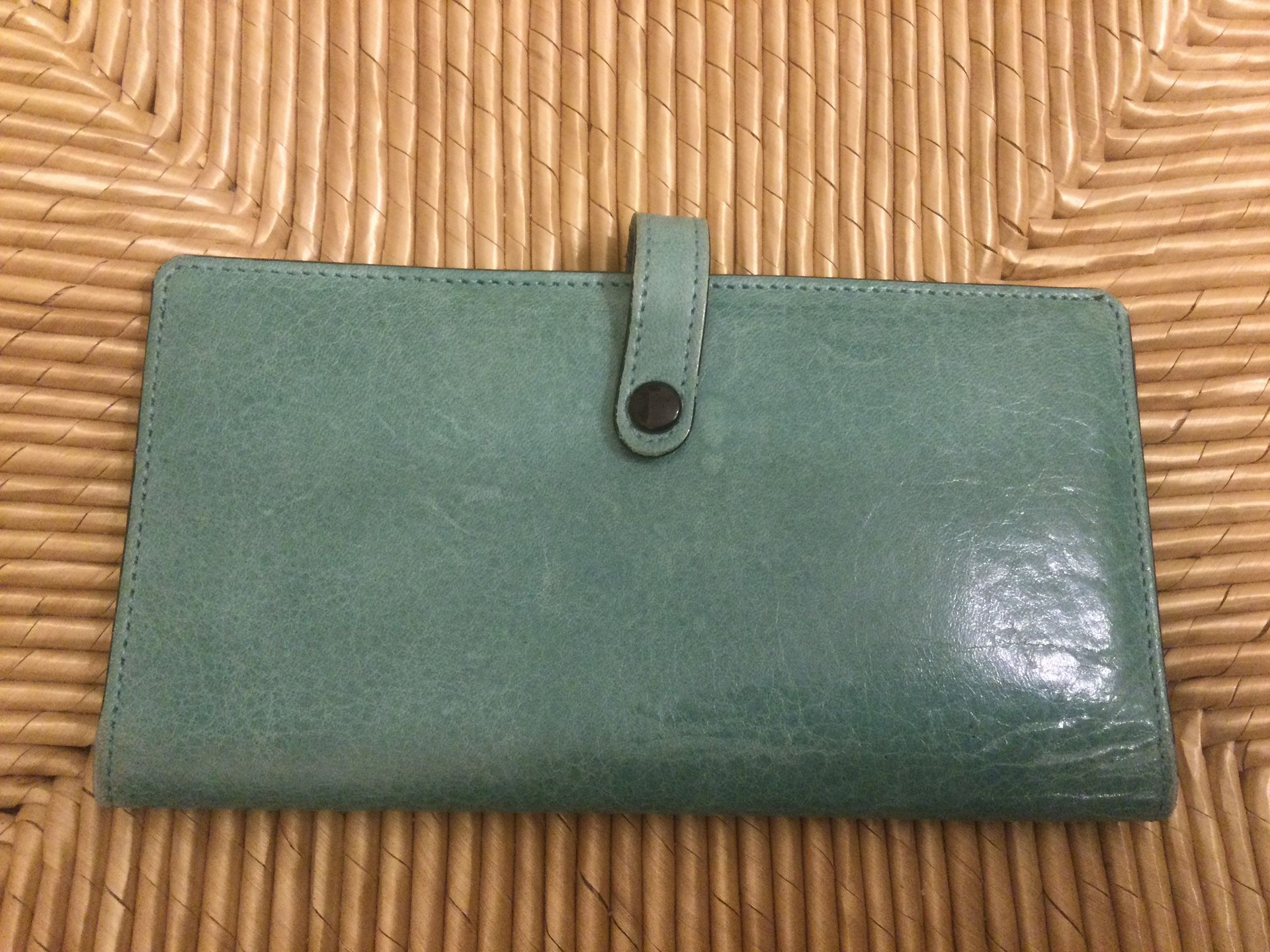 Turquoise aqua colored leather wallet