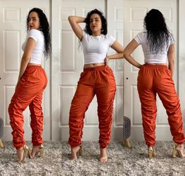 Women’s Ruched Jogger Pant Front Rise 11” in seam 29” Fabric: 100% Polyester Made in Vietnam Color: Rust Size: Small, Medium, Large