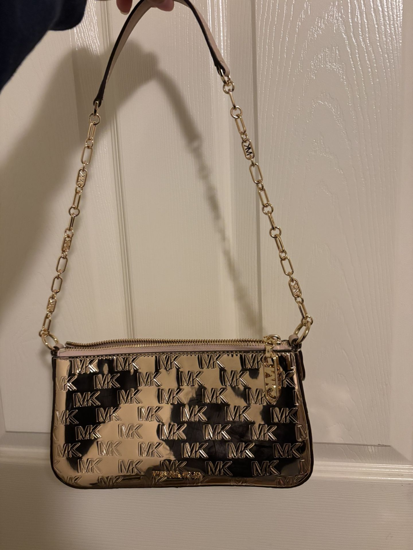 MK rose gold purse