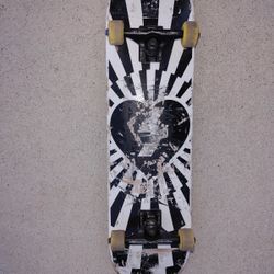 Preowned skate board with industrial trucks