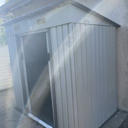 Outdoor Storage Shed With Shelves In Great Condition 