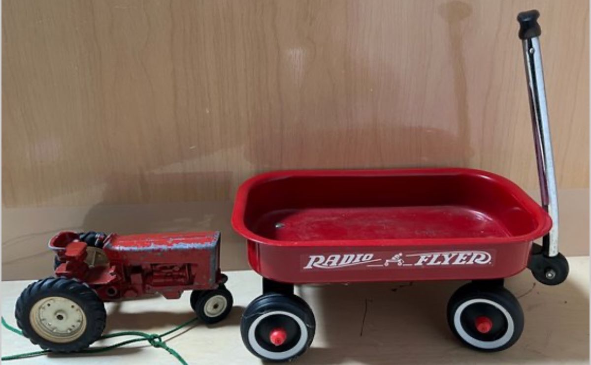 VINTAGE METAL TOY TRACTOR WITH RADIO FLYER WAGON HITCH