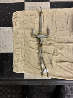 Chrome and brass faucet.