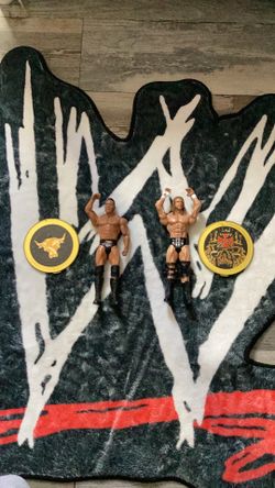 WWE Championship Showdown Series 2 The Rock vs. Triple H 2-pack typically