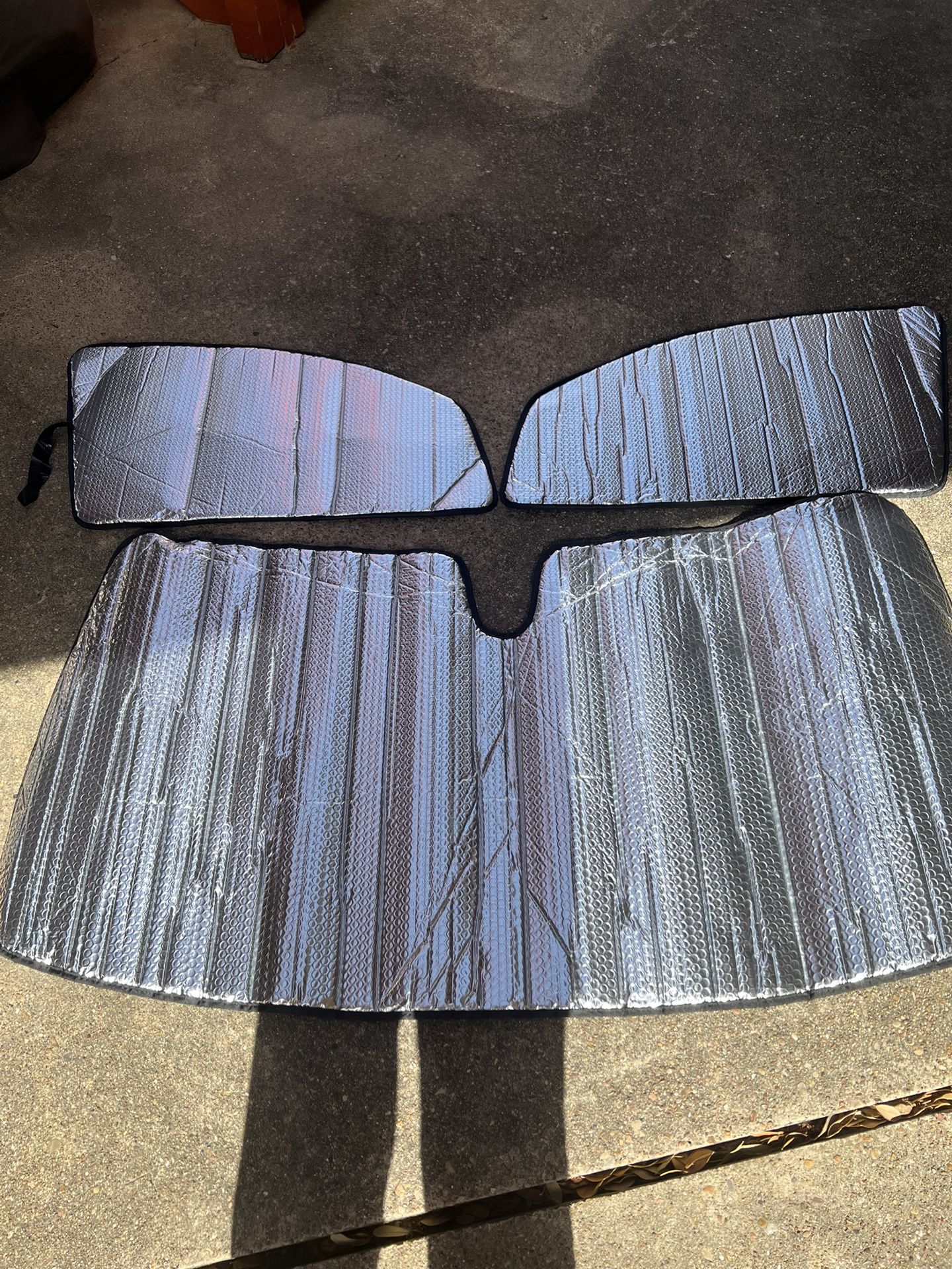 Sunshades- Windshield ,and Side Driver And Passenger Door.